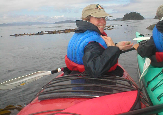 While sailing on the Inside Passage in search of Orcas, we anchored and explored the shores. Here I am kayaking and checking out a sea urchin.